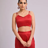 Red Overlapped Neck Bustier Paired With Pleated Pants