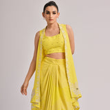 Yellow Assymetrical Long Jacket Paired With An Embroidered Bustier And Front Open Drape Skirt