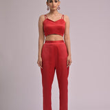 Red Overlapped Neck Bustier Paired With Pleated Pants